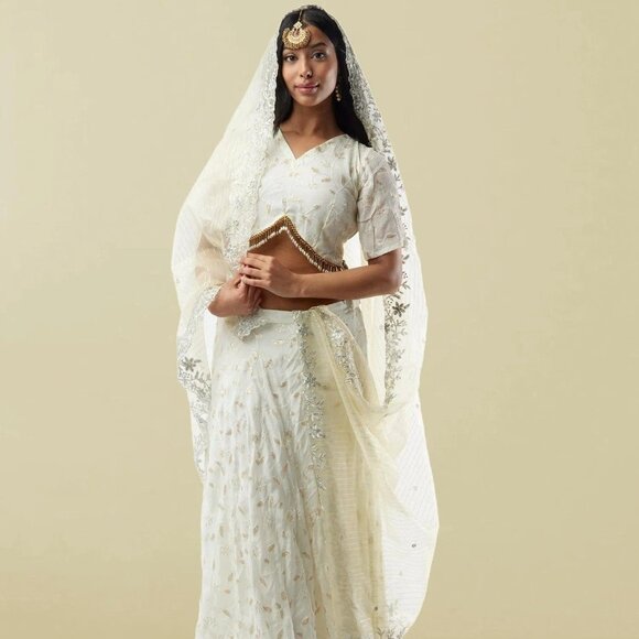 White Banarasi Georgette Lehenga with Lace | Muvvas Boutique - Picture 1 of 6